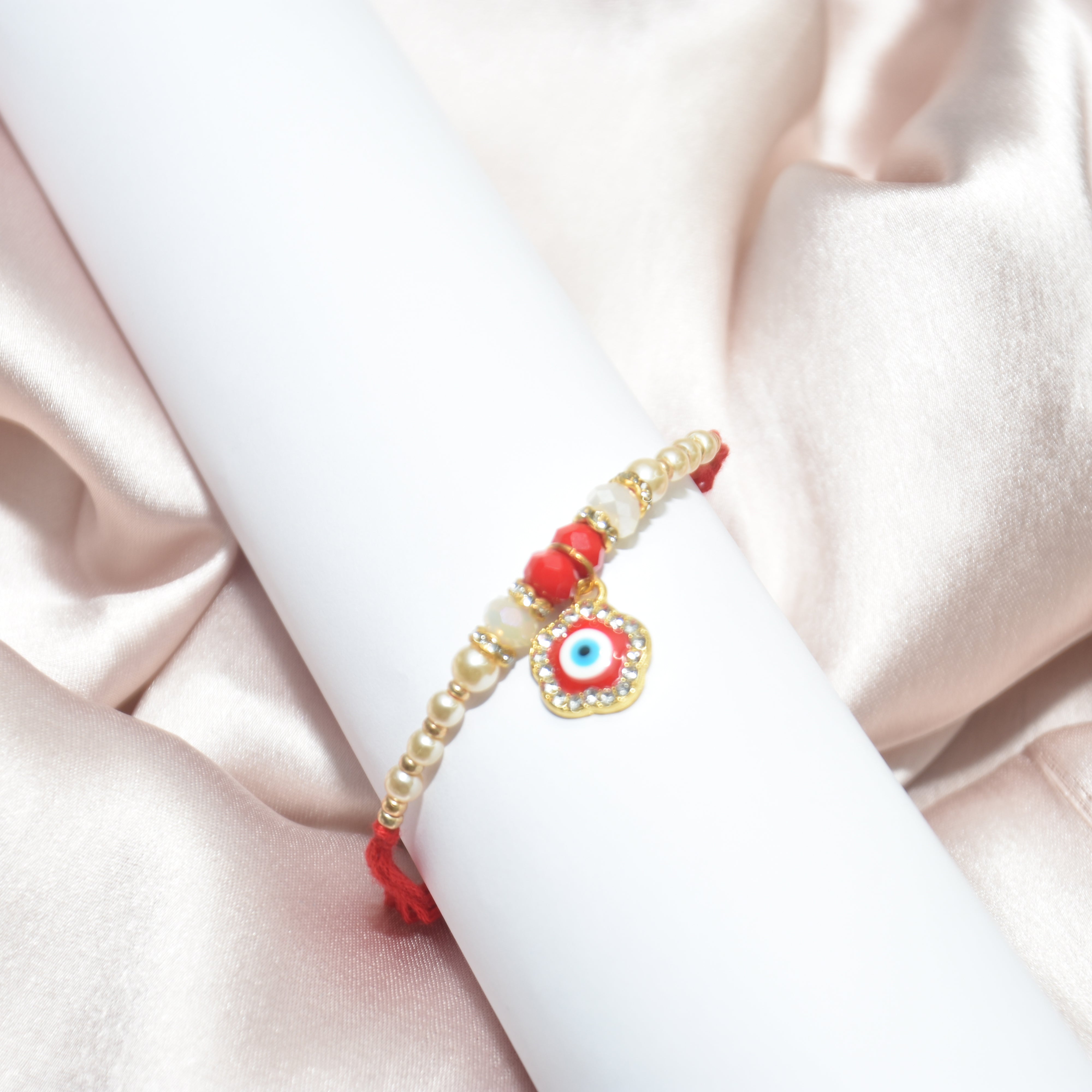 Flower and Pearl Designer - Red Rakhi