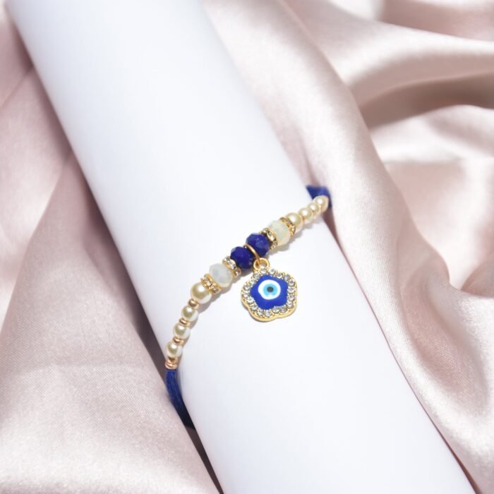 Flower and Pearl Designer - Blue Rakhi - Image 1