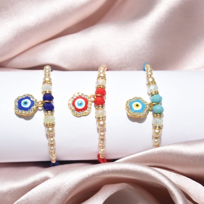 Flower and Pearl Designer - 3 Pairs Rakhi - Image 1