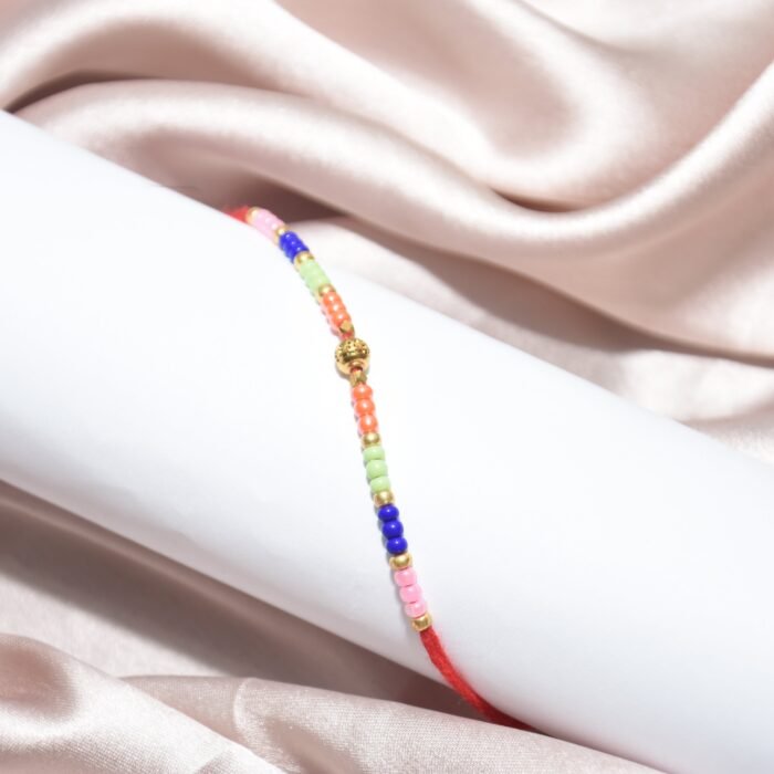 Pearl Designer - Multi Colour Mauli Rakhi - Image 1