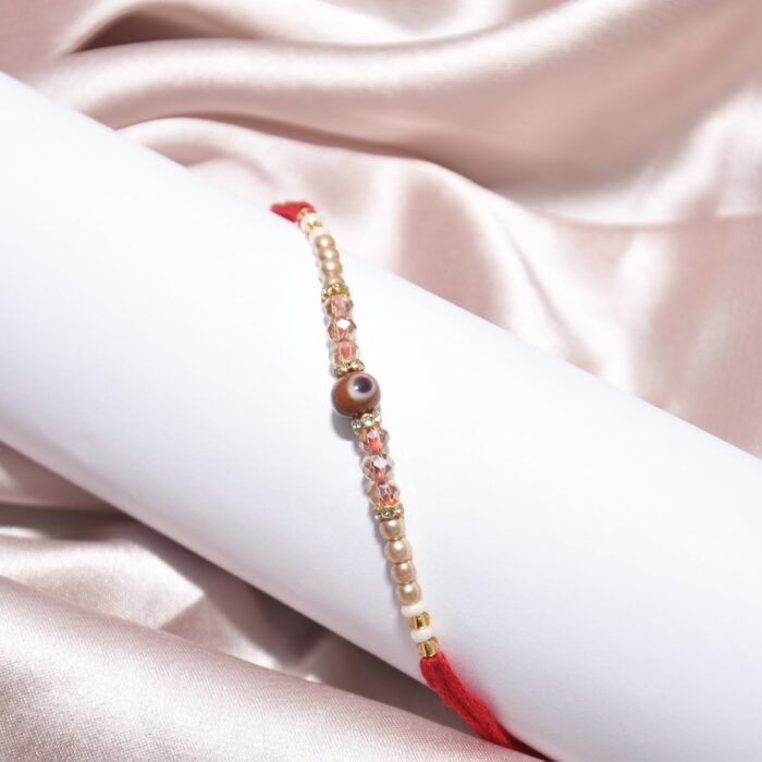 Pearl Designer - Evil Eye Mauli Rakhi - Image 1