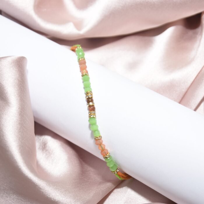 Pearl Designer - Pink and Green Rakhi - Image 1
