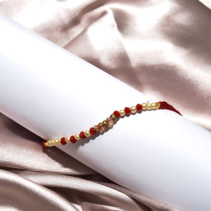 Red and White Pearl - Designer Rakhi - Image 1